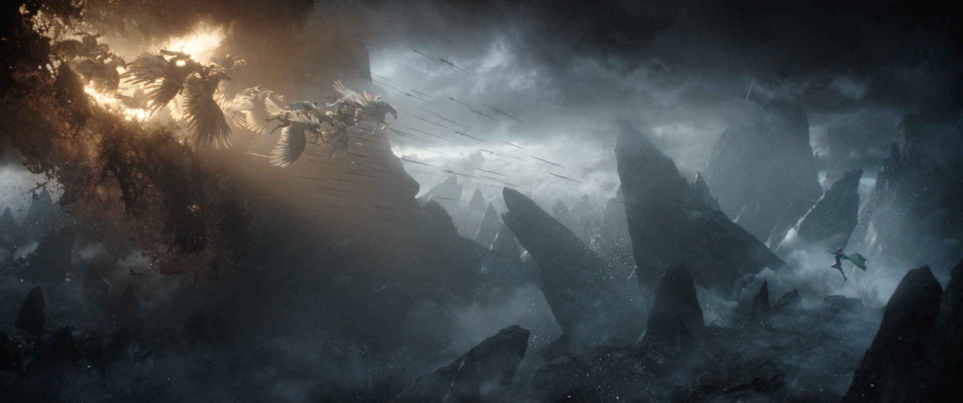 Walküren reiten auf geflügelten Pferden aus einer Wolke in Richtung von Hela in einer düsteren Umgebung in einem Szenenbild für Kritik Thor Tag der Entscheidung