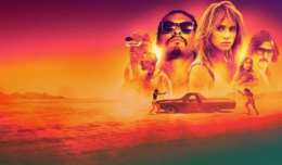 Titelbild für Kritik The Bad Batch mit Jason Momoa, Suki Waterhouse und Keanu Reeves in einer Wüste