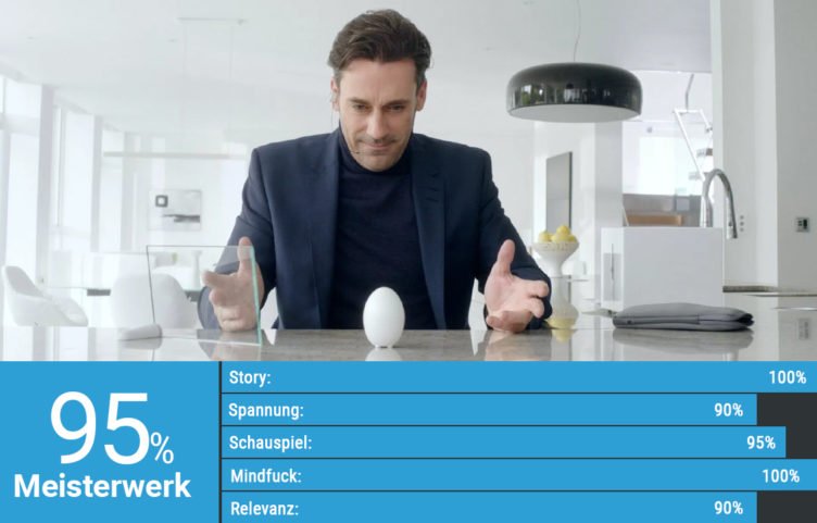 Jon Hamm sitzt vor einem weißen Ei in Black Mirror Staffel 2 Weiße Weihnachten